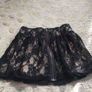 Lacy gold and black mini skirt